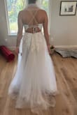 It came down to this one and one other dress. I was obsessed with the beauty. The quality was amazing for the price and fit perfectly. Loved the strappy back. If only they had this dress in a champagne undertone, it would be the one! - Caitlin K.