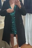 I received my dress and I was sooo impressed with the quality.  The sequins/shine were not cheap by any means. The dress feels heavy and perfect for new years. It's lined and fits really nice. It's very forgiving actually.  It's a bit low but I can just pun or sow the front. I wish they had other colors. I ordered Large for my 160lbs body. - Gabriela V.