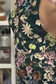So this arrived and totally smells like someone else's perfume or lotion. And it is either the worst cut/fitting top portion ever or it was worn by someone with large breasts. It's full gapping on both sides which sucks because it fits perfectly everywhere else. For context, I am a 32 D cup and my breasts are swimming in the top. So confusing and disappointing. Have a wedding to attend Saturday and am SO bummed. - Lauren S.