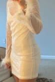This dress is great if you are a petite frame. It lays nicely and is very flattering overall for the price. Its perfect for going out and not worrying about ruining it or having to wear it again, because let's be real, you're never going to wear "bride white sequin" looks after you get married. - Jennette D.
