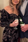 I saw several reviews to size up, I disagree. I sized up and it was a mistake, shoulders and sleeves were entirely too big as well as bust area.  Boyfriend had to actually buy a sewing kit and sew the back up on the way to the party and even then, shoulders slipped off. I did like the material and length & would recommend ordering your normal/usual dress size! - Katie L.