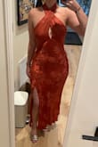 Purchased this for a wedding where the bridesmaid color is burnt orange/rust color. This dress was perfect! The material feels very nice and lux, it's heavier than most satin fabrics but in a good way (ie doesn't look cheap). The print is super favorable around the stomach area bc it hides a bit. Neckline is very nice as well. I'm curvy and was so pleasantly surprised that the dress (M) fits around my thighs without looking stretched out/ too tight. I'm normally a size 6-8 in pants (depending on stretch) and have a small waist and an M for me perfectly. - Andrea R.