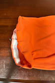 I washed this one time before I even wore it for my vacation and the quality really shows!   The edges on the top bottom seam and the skirt bottom seam are really curled.  The waistband isn't even stitched down.  Super poor quality.  Cute design just looks terrible before I even wore it one time! - Heidi R.