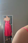 I liked to twirl my dress and the back strap hid my strapless bra nicely, but I would have liked the slit to have been higher to show more leg but maybe that's because I am short it didn't. - Ruth D.