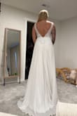 This dress was very cute and flattering on. The bottom was simple which made the top only stand out more. The only downside is the cups in the top were EXTREMELY white so they just stuck out and were very noticeable to me. - Ariel B.