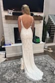 This dress was stunning! I loved every aspect of it. In the end, it was a little too long and I went with another option but the details were amazing and fit very well! There wasn't any boob padding so just take that into consideration. - Ariel B.
