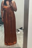 Color is pretty but the dress runs big. Does not fit. Too long - Priscilla A.