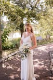 Fit perfectly! Bought it the day before my wedding. I wasn't in love with the original dress I purchased. I was lucky the dress fit perfectly and was so beautiful. - Savannah M.