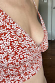This top is VERY poorly made and makes your boobs look so so weird. I read a bunch of reviews saying this for larger chests, but I thought I might be ok because I'm only a B cup. Nope!! It's like it's sewn by someone who's never seen boobs. I tried it so many different ways and they all looked bizarre. Was going to upload pics of all the ways I tried it, but I can only add 2. Adjust the straps and it just gets worse. There was no way to make it look decent even with a bra/bralette under it. It's a shame because I want to keep the skirt, but I'm bummed I paid $70 for the set and can't return just the top. My recommendation would be just to not buy this at all unless you want to pay that much for only the skirt! - Autumn C.