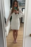 Purchased for my bridal shower this March. A little tight around the tummy and hips as it fits more like a body con dress, but I wouldn't size up as I think it wouldn't look as good. Very comfortable! You'll need either a bra that has very wide straps due to the box neckline or a strapless. I'm not well endowed in that area so I'm going to use the adhesive covers as it fits pretty tight on chest. - Lucy J.
