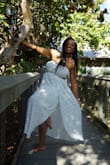 I wore this on my vacation to Florida. It was beautiful on the beach. Comfortable and flowy! I just felt better without the sleeves around my shoulders so I just tucked them into the dress. 10/10 I love it! - Christine N.