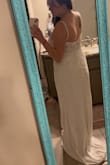 I was really hoping to love this dress! It ran a little large in some areas, didn't support me well in the chest, and the built in cups were odd and too small for me. The waist was loose and it didn't show off my shape well. I loved the beading and the material was nice. It was on the heavier side. - Bailey Y.