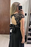 First time ordering from Lulus and I was really worried the quality wouldn't be like the picture but it's good. Sizes are pretty friendly, Im normally a medium or large. Only thing it was a little too long (Im 1.65) so I had it fix. Very nice back that holds your bob better (definitely made for someone with boob rather than non bc of its fit). Has a little opening on the leg but in general very flattering in the waist (very loose). Love it! - Daniela M.