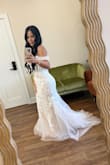 Wore this for my wedding. It fit perfectly. Had to get it altered but only because it was too long for me, otherwise, the dress fit like a glove. - Debra A.