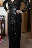This dress is so elegant! It fits like a glove. I tried it in quickly, and I was slouching so my pictures aren't the best, but it feels so "rich". The material is thick enough that I don't need to wear any support undergarments to feel nice in it. (Might get a push up bra though. lol) - Connie S.