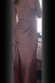 The quality is so nice and the color is absolutely beautiful! The material does not feel cheap at all. It feels like a $350+ dress! Fits like a glove! I can't wait to wear it! - Karlee L.