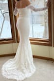 I absolutely loved my wedding dress! It fit perfectly and made me feel stunning on my special day. The fabric, detailing, and overall design were just beautiful. I felt so elegant and confident throughout the day. The only minor issue I encountered was that it was a bit difficult to move my arms comfortably, but honestly, it was such a small thing compared to how amazing the dress made me feel. I would highly recommend this dress to anyone looking for a gorgeous and flattering gown for their big day! - KAREN P.