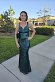 Amazingly beautiful shine, tried on a ton of dresses but fit and fabric of this one was the best! Got a ton of compliments all night.  Very curve hugging, easy to put on, and the back swoop is unique! - Mariya Z.