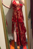Normally, I would prefer natural fibres, but I really wanted a velvet dress, and natural fibres are way more expensive, of course. This is rayon, semi-natural and lined with synthetic, but it's light and soft. The colour is rich and bright, and I love it. Some reviews mention the straps coming off. Mine are sewn on properly, but with much wear, I could see them wearing out at that very thin point, but you just unpick the edge and sew them in again, not a problem. I got large because I have a bit of a tummy. It feels like it fits perfectly, and I usually take a medium in things. I might take a couple of stitches under the arms, but I don't need to. It is too long for me, but there is the perfect spot to pin it or sew it up a few inches, under the top layer of skirt, in the lining material! Invisible even if I don't sew it perfectly. Yes!! Thanks lulus. - Vandi