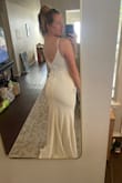 The material is hard to wrinkle. This pic was minutes after unboxing! I love the buttons and the simplicity. It's all just perfect!
Only downside is I had to make the adjustable straps so tight they're on top of my shoulders, but my hair will cover them! - Katherine K.