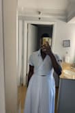 I received many compliments on the dress! I love this dress!
It gives you a 1920s wife look. Snatched at the waist and loose where things need to be flattering. - Maimouna D.