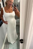 This dress is classic and elegant. The low back and the bow add a little flair. It's fully lined so no undergarments are required, but I purchased nipple petals for a little added coverage. I am wearing this to a charity event and I'm so excited! Trying to decide on shoes and accessories! - Erin H.