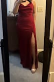 this dress is so pretty and gorgeous! Fits true to size but a tiny bit loose in the back at the waist. It doesn't bother me but maybe someone else. I love the subtle button detail! It is floor length with 3ish inch heels on and I am 5'7. Super cute for prom! - Lily X.