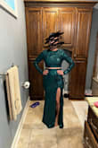 I did not end up wearing this to my event, but it is still a great dress for someone. The skirt was very stretchy and conformed to my body perfectly. My issue was with the top. The bottom hem was so tight, and the fabric did not have give at all. It's beautiful though and most people I asked told me to wear it over my other dress but I went with comfort over style. I was worried I would be adjusting all night. If I planned to wear it, I might have cut a tiny slit in the top at the bottom, so the fabric would give a little. Just a suggestion. - Kayla C.
