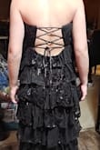 Dress itself was fine, good condition, shipped fast. Daughter's thin build and lack of hips just made it unflattering on her body type. Slit was higher than she felt comfortable wearing. Felt length was a bit too short with heels on. Returned for something she liked better. - Jeanette B.