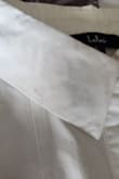 I received the brand-new shirt, but it had a red pen mark on the collar of the white shirt. :( There was no option to exchange. I am so disappointed because it is a great shirt, but I would love to have one that isn't ruined with red pen. - Kate B.