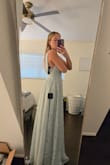 This dress is much larger than expected. It's very heavy and honestly felt like wearing a comforter. Bust ran a little large too. - Allison B.