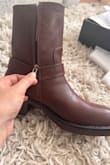 Great quality, the color is brown, not reddish that I like better. The only problem is the zipper, it doesn't go until the end, but still works good. - Brenda L.