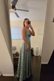 The fabric is really nice and flattering. However, it's too roomy in the chest. It would work better for bigger boobs. - Allison B.