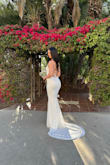 I have never left a review for any clothing before, but this dress literally made me feel so pretty! My county ceremony was IT as my wedding so I wanted to make sure the dress fit beautifully and was classy. It hugged my curves in all the right places! Can adjust and tighten with the back laces. 10/10 recommend! - Delara K.