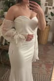 I was very impressed by the overall quality of the dress! It's double lined and stretchy but not a see through fabric. A medium fit almost perfectly. The length is too long & it's slightly too large in the bust but that is to be expected with my body type. I love the chunky pattern on the sleeves & you can remove them too! Would highly recommend this dress! For the price it's a total steal! - Chloe B.