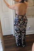 Beautiful dress but the pattern of the dress did not match the picture.  The top had flowers on one side and not on the other.  The middle flower design was crooked.  Beautiful back though - Lilliana P.