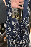 Scored this Beauty on clearance at an amazing price! The dress didn't arrive with a garment bag but I assume its because it was on sale? Anyhow, the dress itself is very well made! The detail and the stitching on the fabric is incredible! The website photos don't do it justice. It's a little snug in the chest area as I am in between a medium and large size for this brand. - Debbie W.