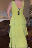 Love love this dress!! I had to switch from a Large to an XL for it to even zip up. Once I changed sizes- it was perfect! I love this dress and I am so excited to wear it!!! **It will need a low cut bra since the one I was wearing showed. - Carrie J.