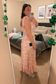 Normally would wear a medium but I sized up to a large as I'm pregnant. I think it's cute, super long on me, I'm 5'6". I will need to wear a bra under (34DD). - Morghan H.