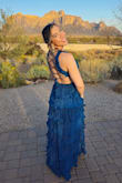 Beautiful rich color as pictured. Wore to a wedding and got many compliments. I'm usually between a Small and a Medium on Lulus dresses and the small was perfect. I'm 5'6 and 145 lbs with 34C bra size. I loved the dress and felt comfortable dancing all night! - Karen N.