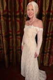 This dress is amazing! It fits perfectly! The material is thick lace with an underdress that's soft and nude colored! My groom was stunned and thrilled! - Amy K.