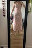 This was way lower quality than I expected. The seams were sticking out on the sides, and the top was unlined chiffon and very thin. It also did not sit like in the photo no matter how I tied the back, and the cowl back did not flow naturally. The skirt part fit nicely but I did not keep the dress because it just wasn't how it looked in the photos - Gloria L.