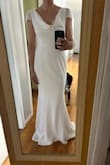 I am having a small backyard wedding and didn't want to spend a lot of time or money on a dress. I saw this and loved it and hoped it would fit. I was worried the material would feel thin or cheap. This dress exceeded my expectations. It fits near perfectly and the fabric is nice and thick. This dress is so elegant looking and exactly what I wanted! - Grace B.