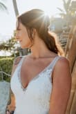 Absolutely gorgeous wedding gown!  Fits true to size & very flattering.  Was even long enough for me being 6' tall! - Megan W.