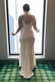 Absolutely loved this dress. It was so comfortable and flattering. Ordered a L. I was able to wear without a bra and offered enough support but also could have worn a strapless bra if needed. Stretchy material. I could have also gone up a size to XL but I wanted the fitter mermaid look. I would totally recommend this dress. - Audra L.