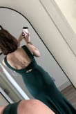 I'm usually a smedium in dresses and have to decide a size based on fabric. This fabric is thick, stretchy, and easy to move around in, and small fits me perfectly! Also, I love the back!! - Miranda R.