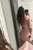 This was a perfect fit for me! It is very flexible. No too short and not too long. I love the back detail as well as the straps are so sweet! It did not bother me at all! I love every aspect of this dress! - Demet S.