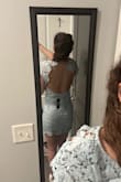 I'm in love with this dresss! Extremely stretchy very flexible. Incredibly cute! The back detail is so cute!! I kept it and will be wearing it for my white coat ceremony! Fits perfectly for me! - Demet S.