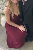 I ordered both the XS and S and small was too big so returned. XS fit perfectly. This dress is stretchy and comfortable, but it's definitely long. I am 5'4 and needed it hemmed when wearing with heels.

I wore this to the mother son dance, but this would also be good as a wedding guest or gala type event. Will wear again. - Ellie M.