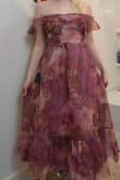 The floral fabric is scratchy. The lining is quite soft so this only presents as an issue with the sleeves. Just trying it on for 5 minutes irritated my arms. Some of the seams are unsightly, mainly the one right below the waistband/tie (pictured). The bodice lacks structure, though I don't know that it'd necessarily slide down without adding structure. In the close up picture, I'm slouching slightly and it folds on itself. I just prefer a bodice of this style to be more supportive. All that being said, it still looks like the picture and I think it's very pretty. I will, however, still be putting some work into it because I don't find it wearable as is. - Kim J.